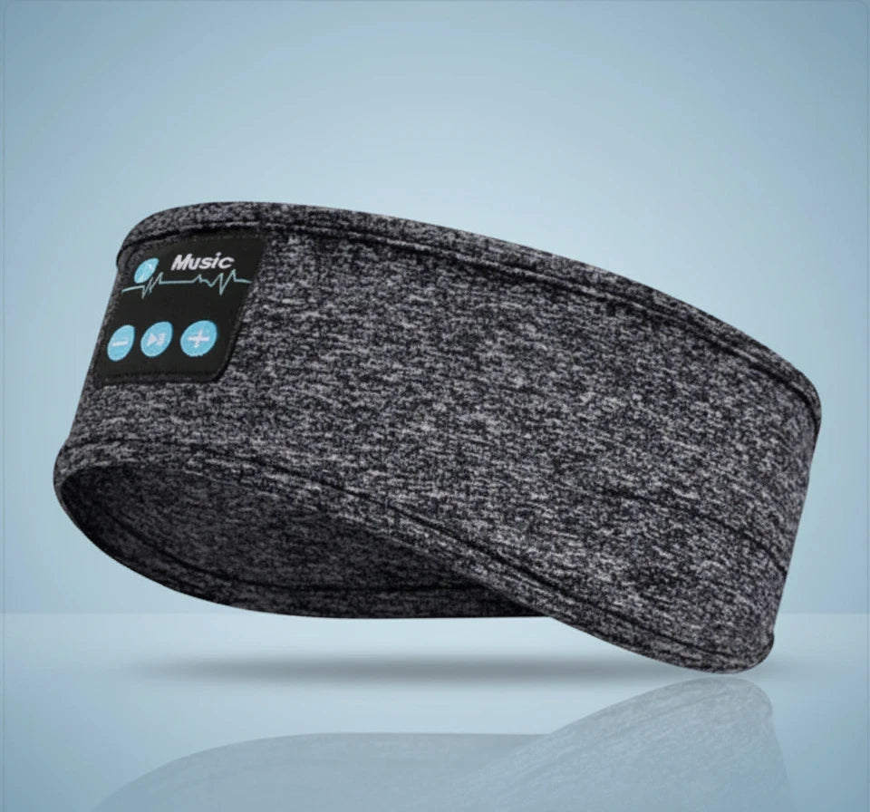 Gray SkiWell Bluetooth music headband for skiing and outdoor activities